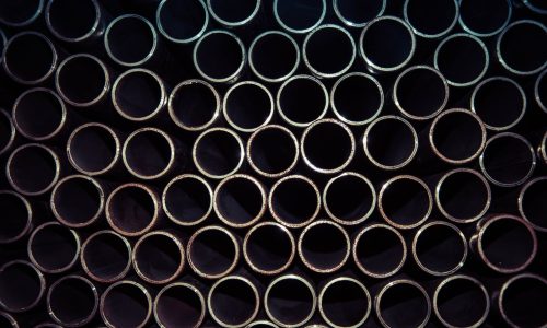 close up photo of gray metal pipes